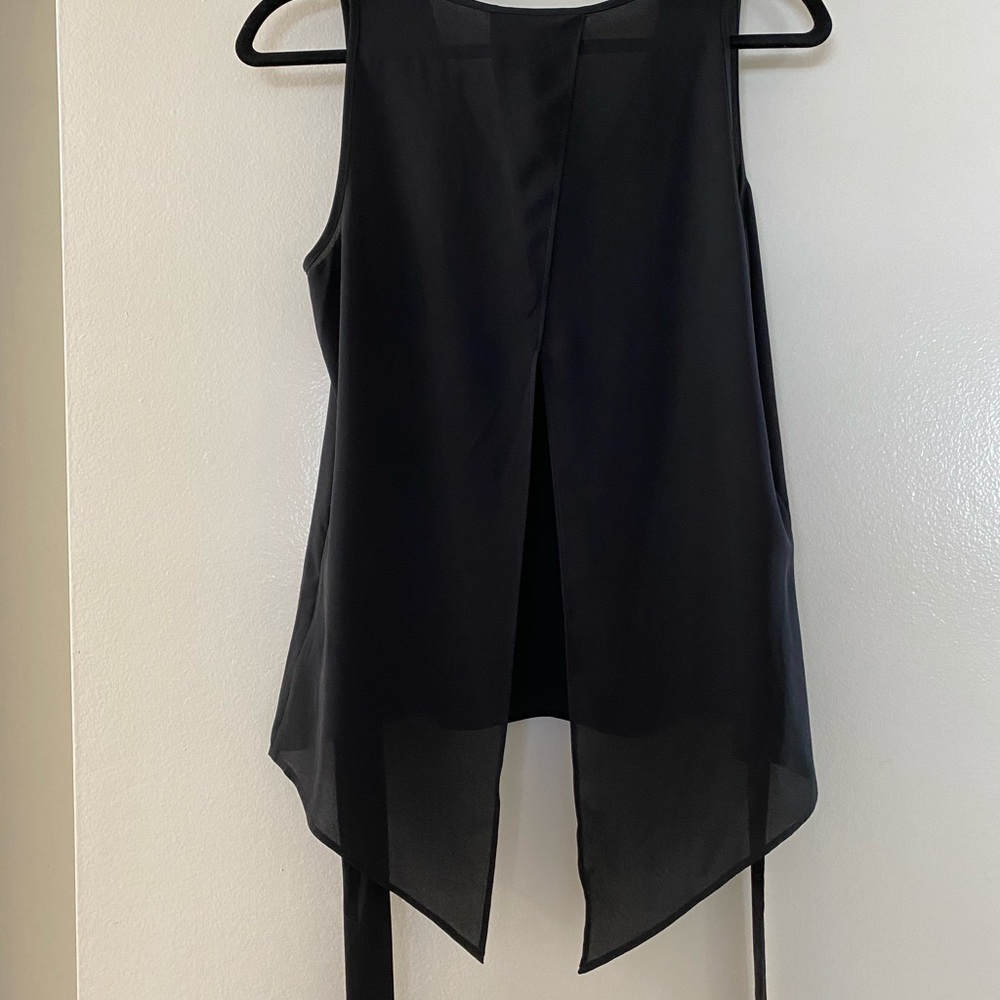 Shear open back black top